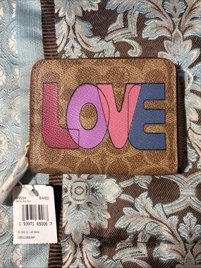 Coach Brown Signature Zip Wallet with Pink, Purple & Blue LOVE Graphic